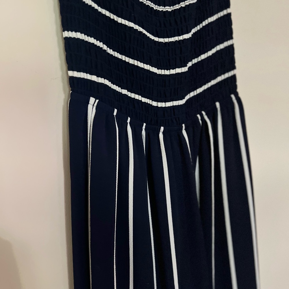 strapless,  Palazzo style jumpsuit. medium- sexy  slits up front of pant legs